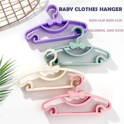 10pcs Portable Kids Clothes Hanger Plastic Display Hangers Household Baby Coat Rack Thickened Bow Coat Hanger Clothing Organizer